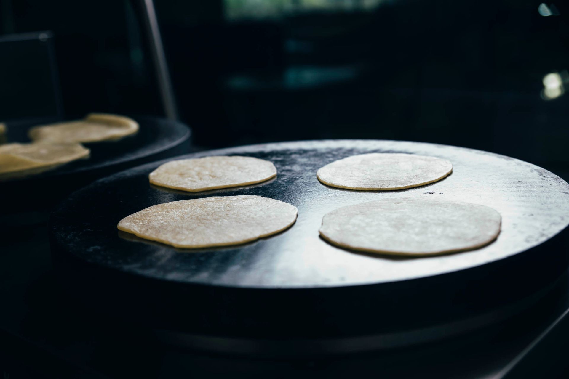 4 Taco Shells on a Hot Plate